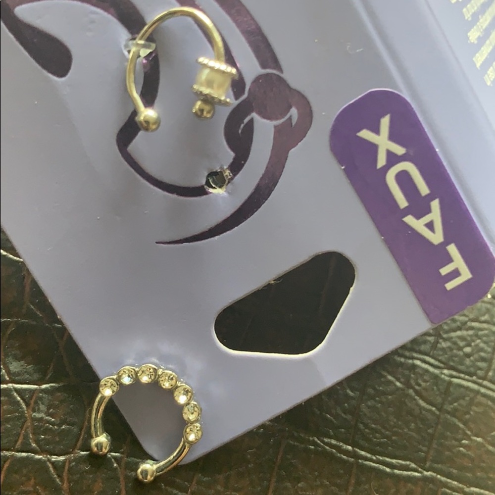 Nose clips or nose rings . New